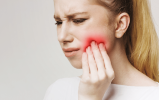 Image of woman suffering from a tooth ache