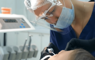 Image of dentist working on person's teeth